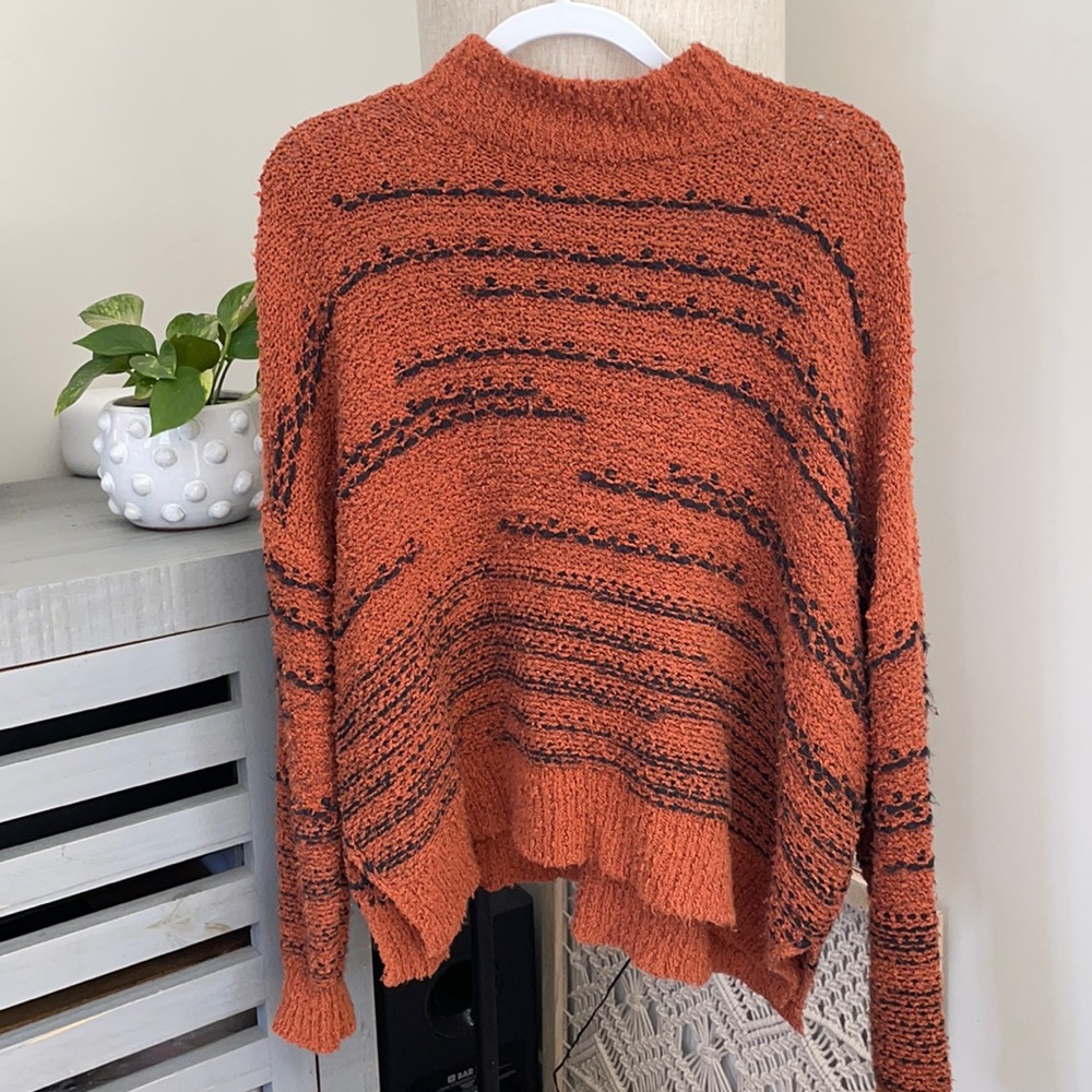 Orange and black stripped sweater